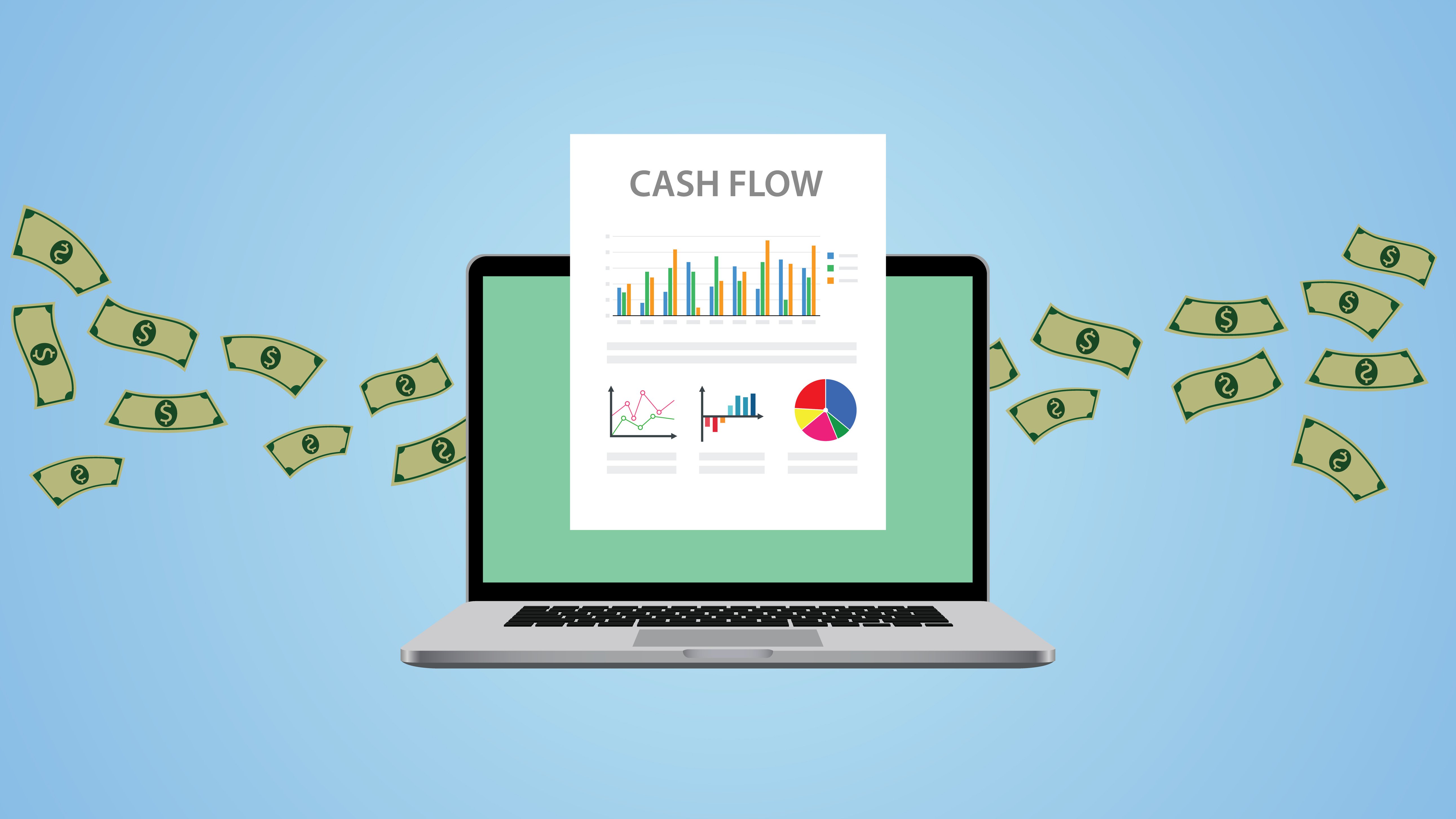 Image with laptop and a cash flow report