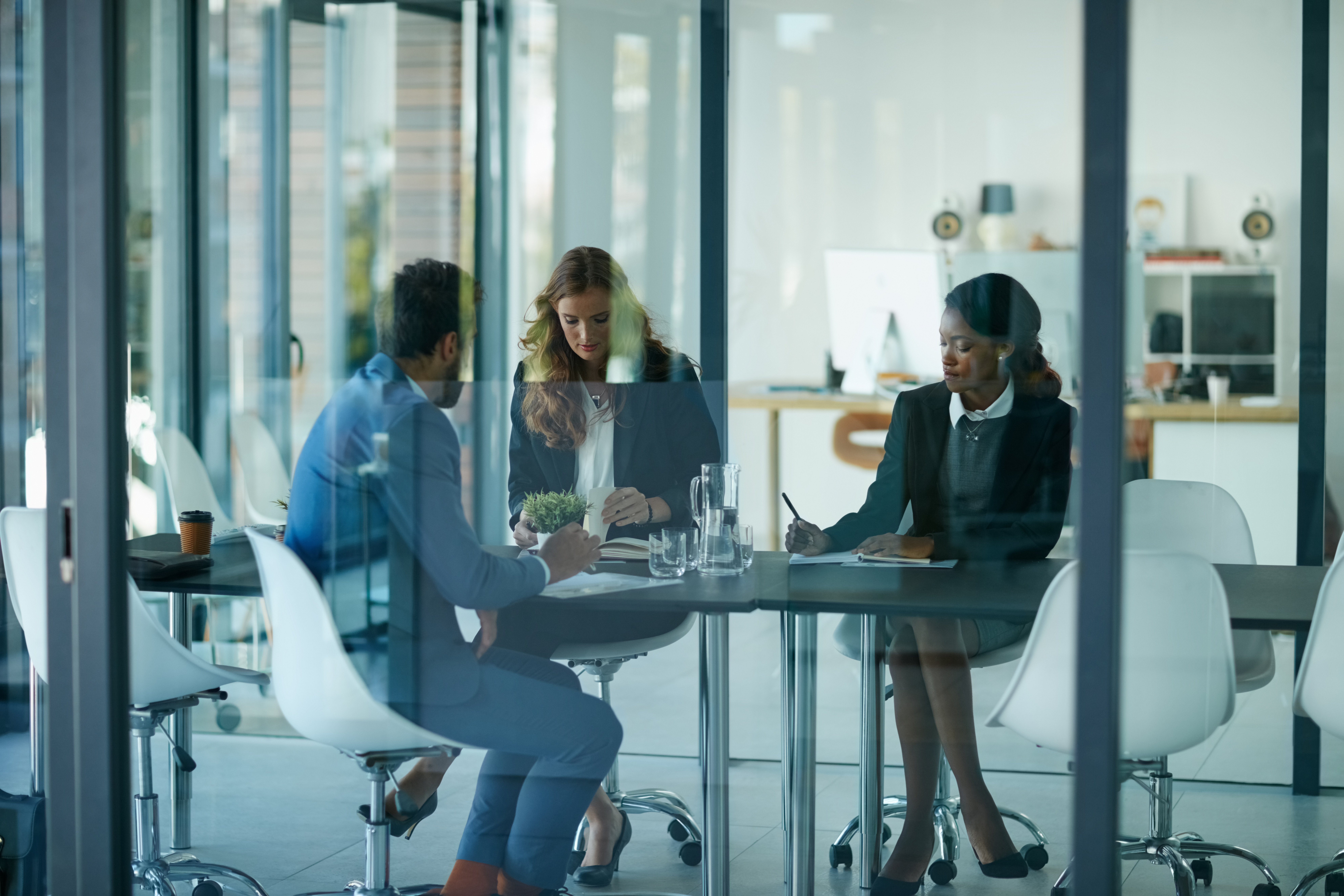 Staffing agency employees having a team meeting